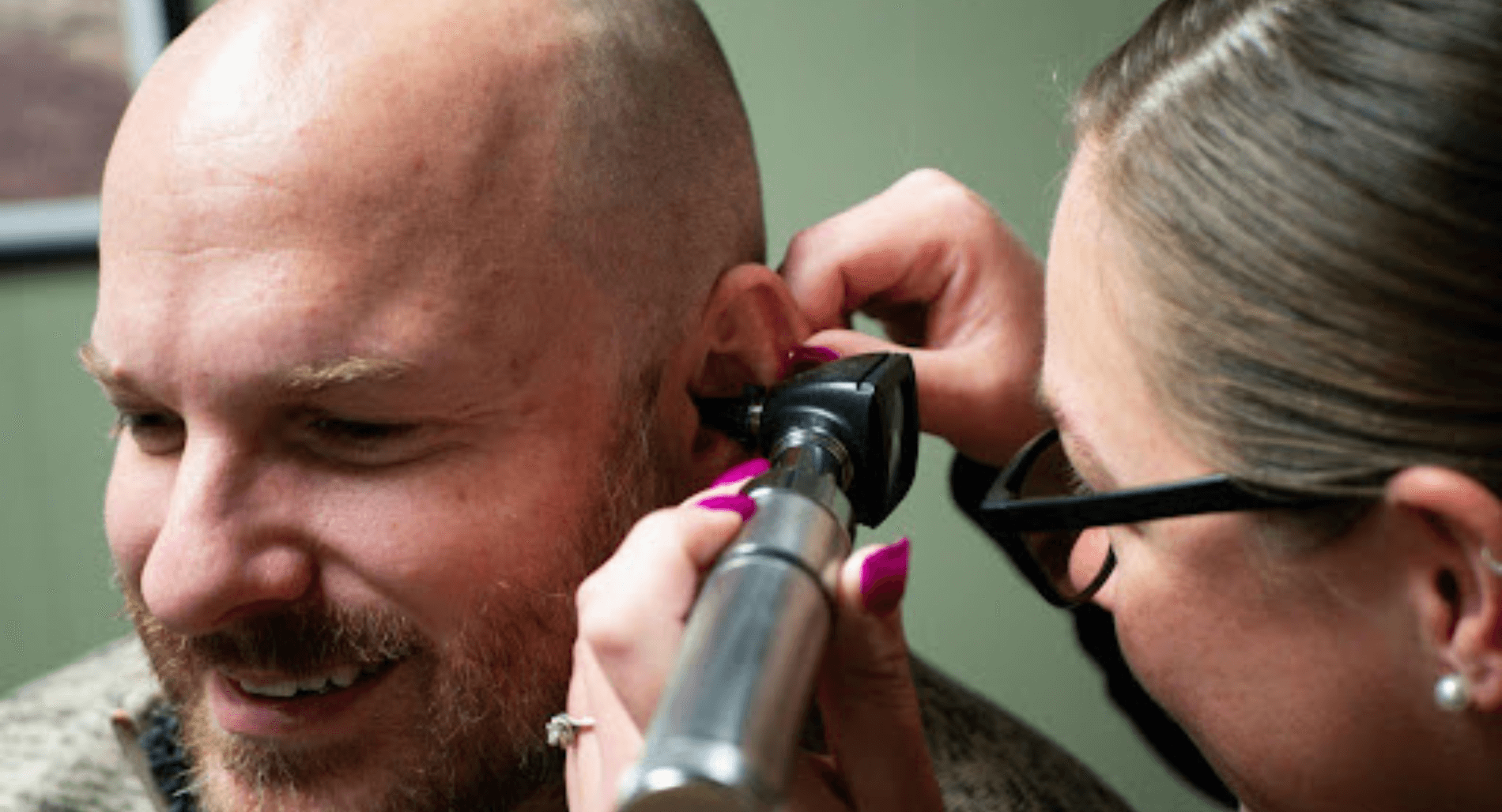 A man receiving a hearing test