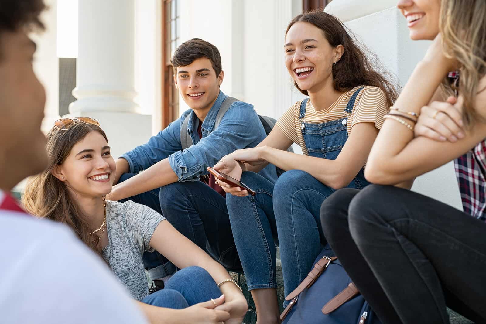 Friends Chatting Together About Hearing Loss