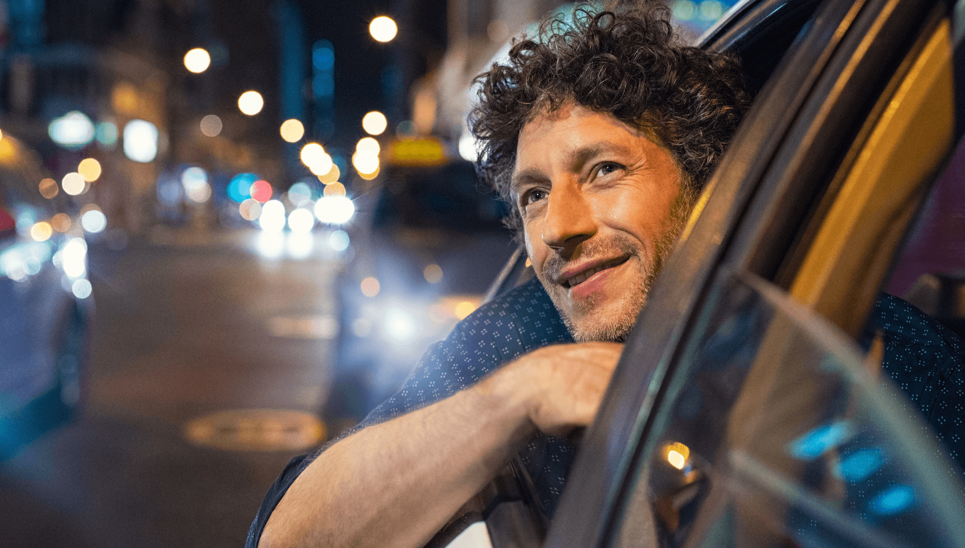 Man With Head and Arm Sticking Out of the Car